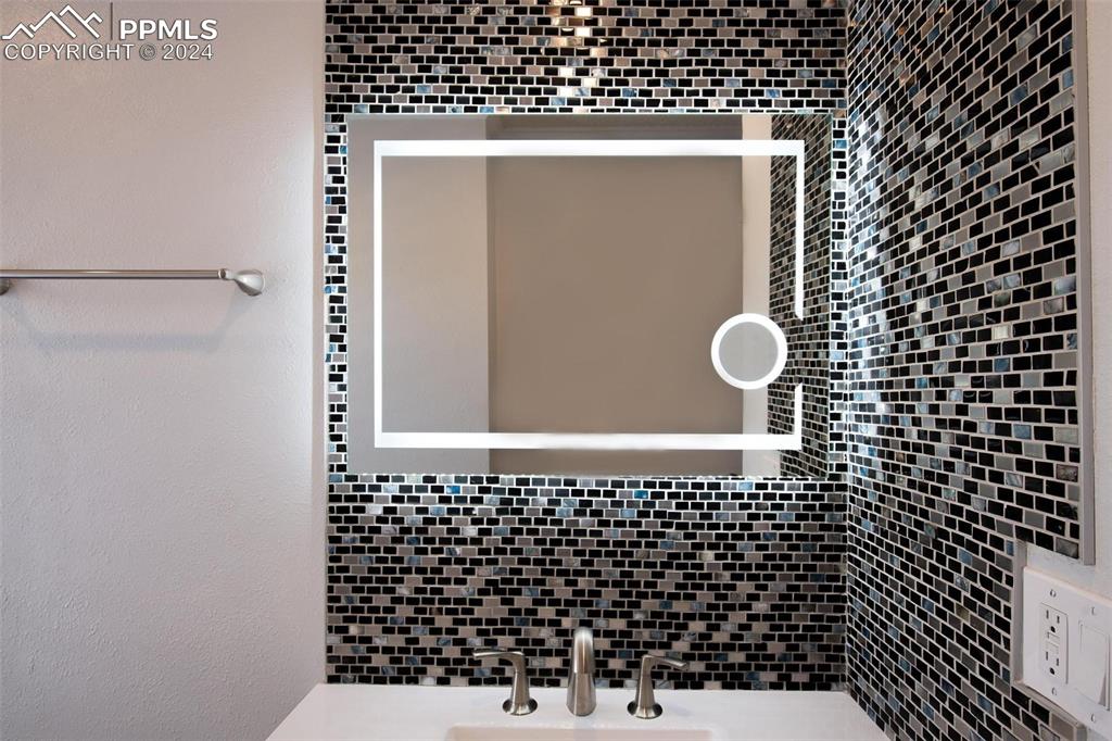 3738 Red Canon Place Colorado Springs, CO 80904 - Photo 6 of 27 a bathroom with a shower