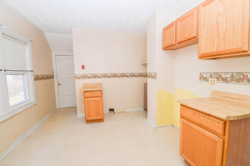174 Pasco Road Springfield, MA 01151 - Photo 6 of 21 a view of kitchen and utility room