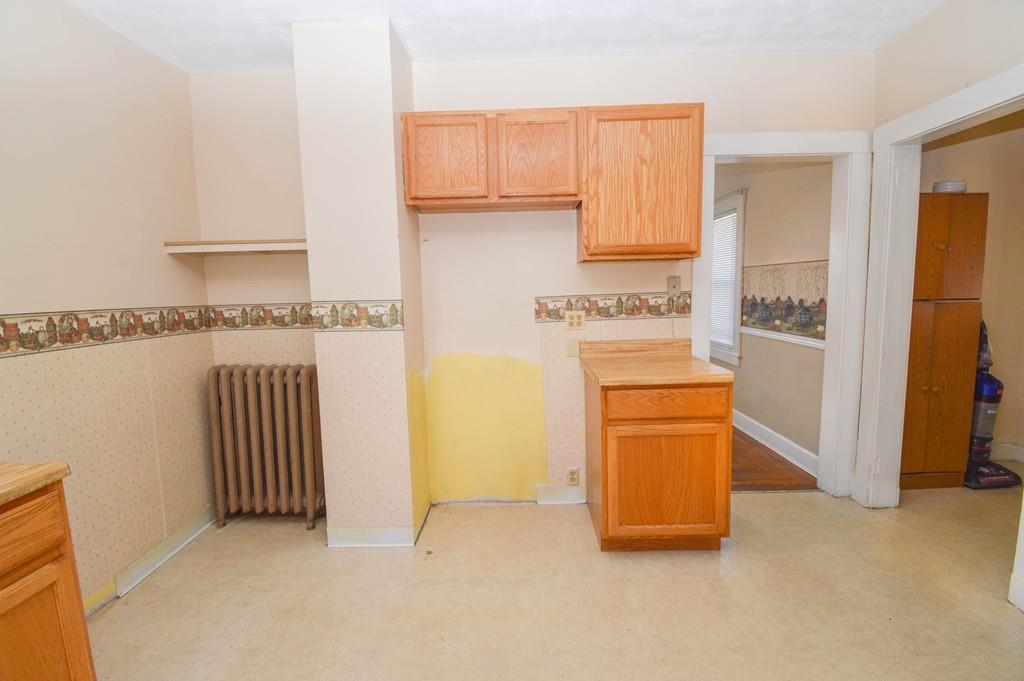 174 Pasco Road Springfield, MA 01151 - Photo 8 of 21 a kitchen with stainless steel appliances granite countertop a refrigerator a stove a sink and dishwasher