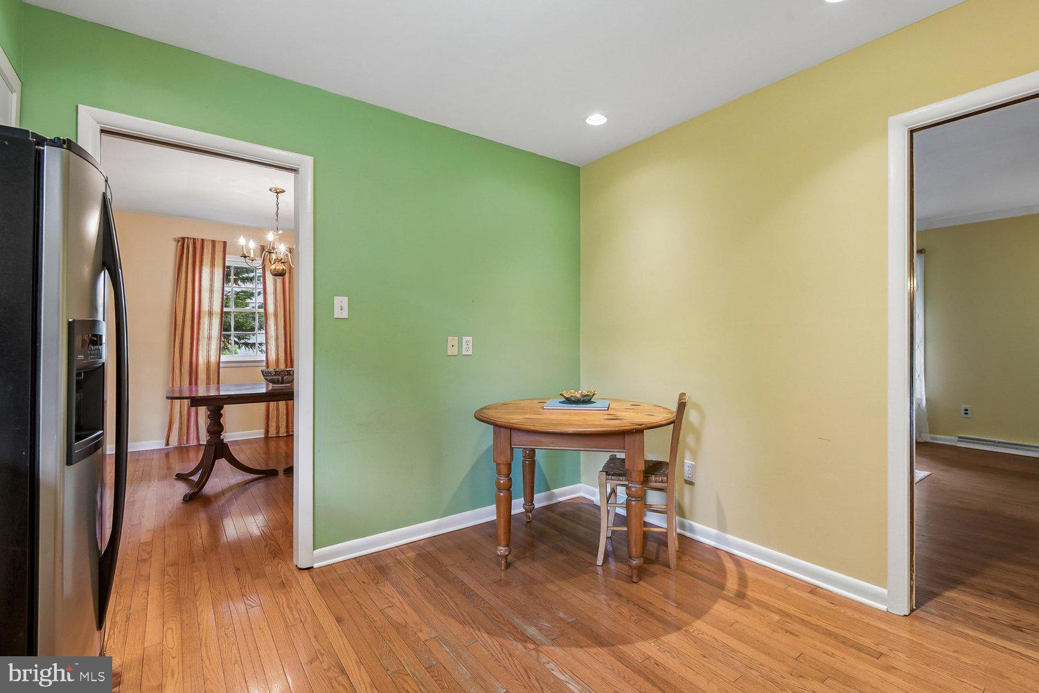 1518 Winchester Road Annapolis, MD 21409 - Photo 20 of 70 a view of a room with wooden floor lounge chair and a mirror