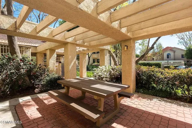 a outdoor space with lots of furniture and garden