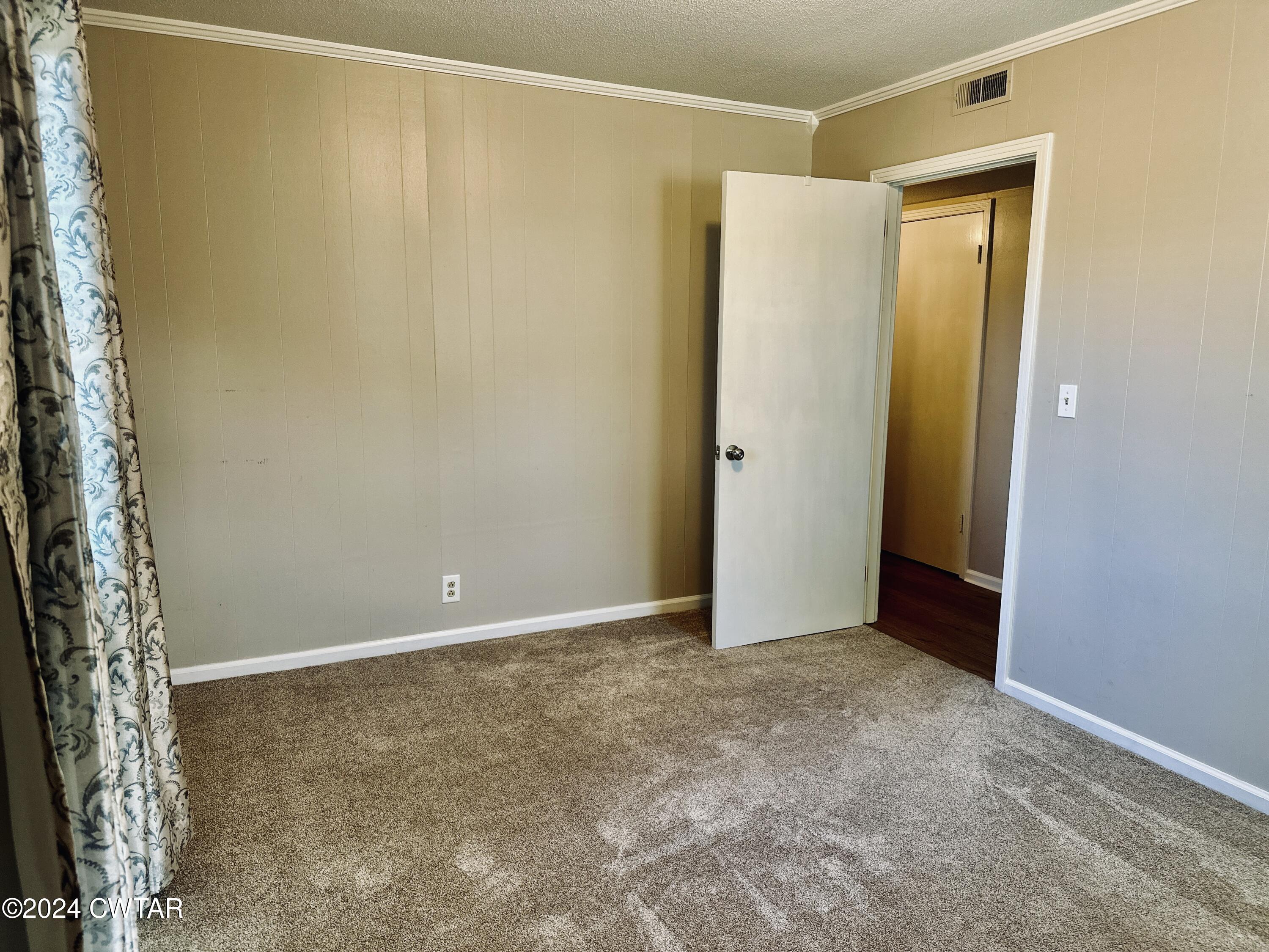 925 McKnight Street Rutherford, TN 38369 - Photo 19 of 23 a view of an empty room with closet and a window