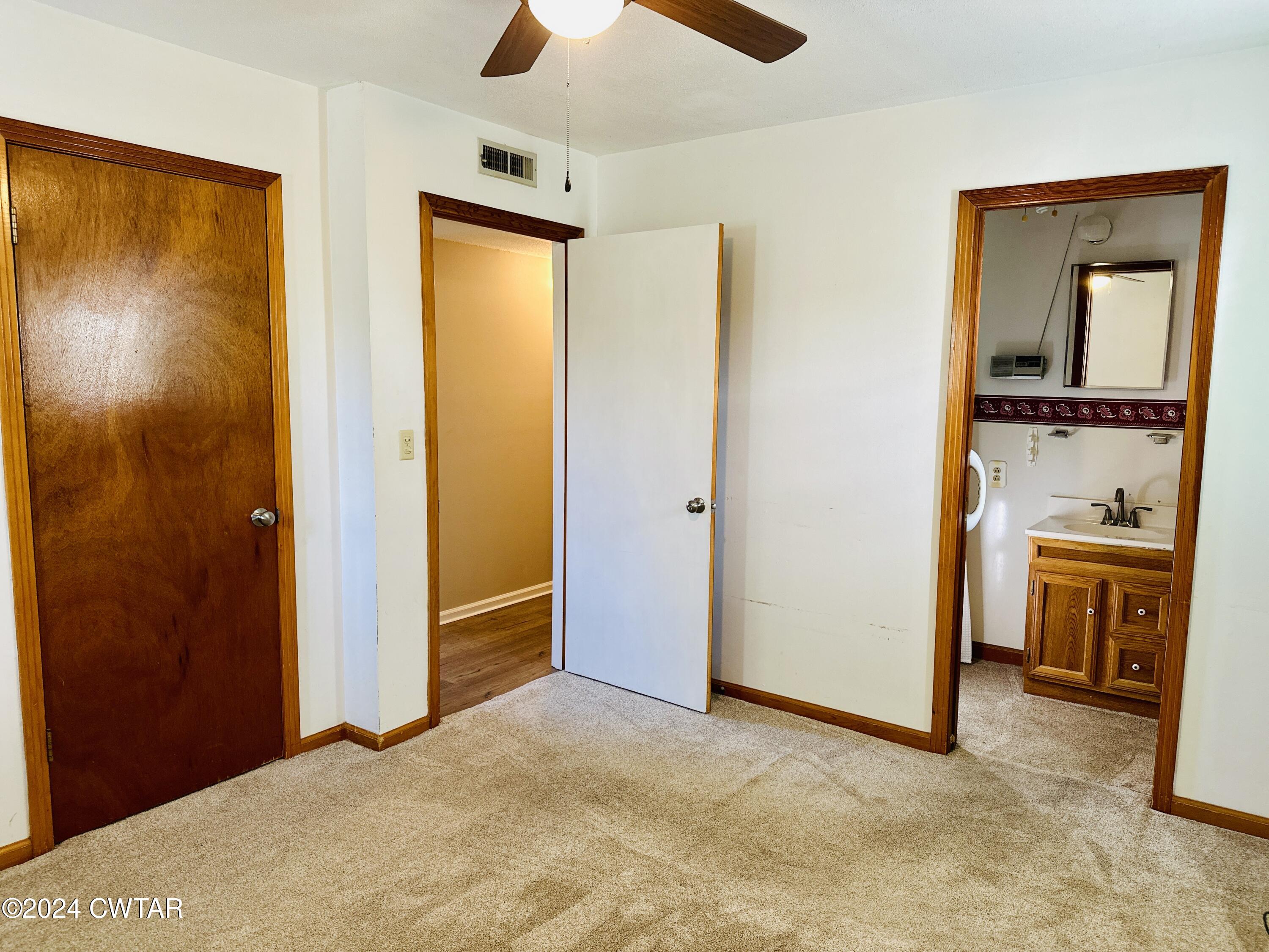 925 McKnight Street Rutherford, TN 38369 - Photo 20 of 23 a view of a bathroom with a tub and a sink