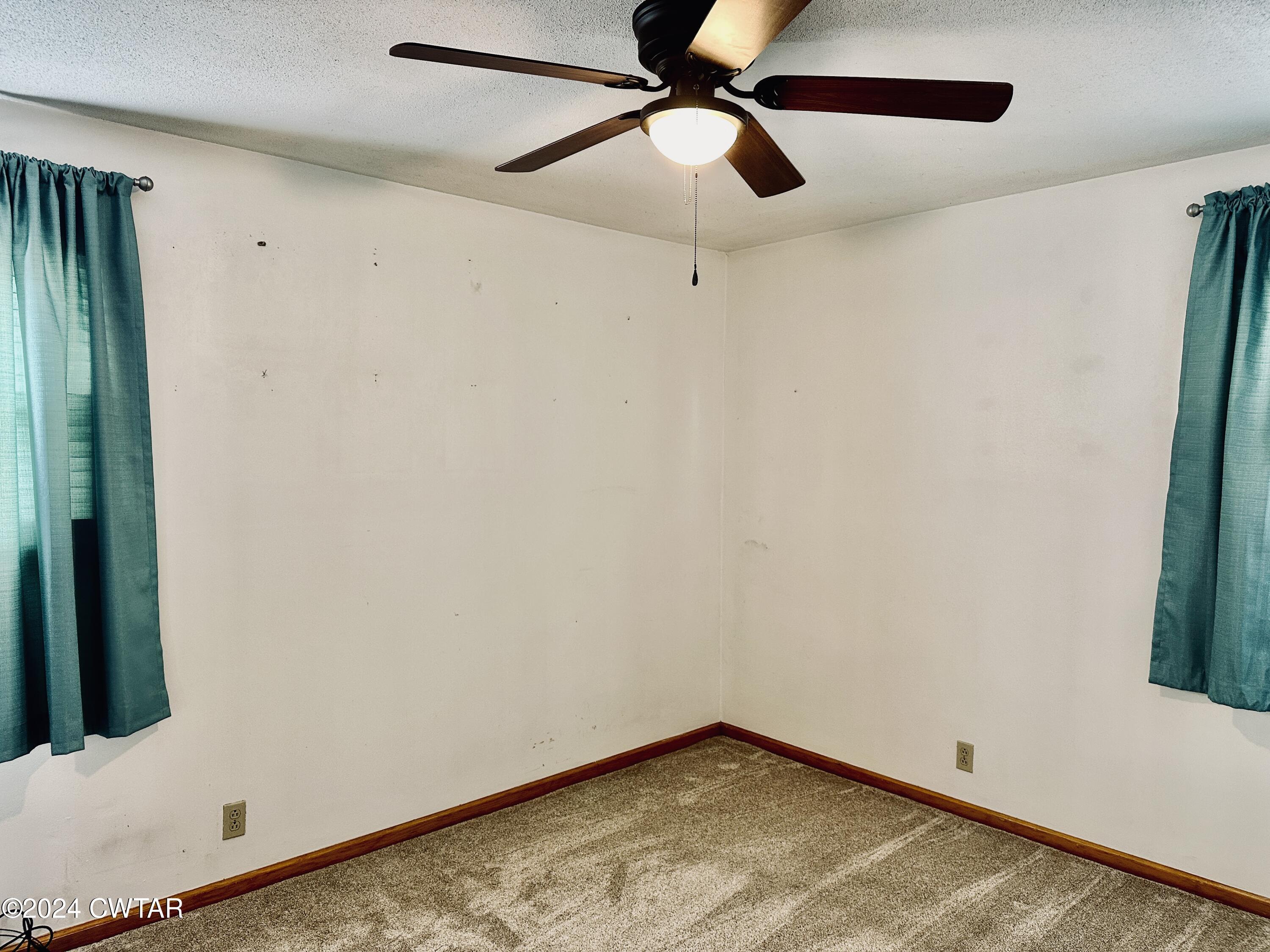925 McKnight Street Rutherford, TN 38369 - Photo 21 of 23 an empty room with a window and a fan