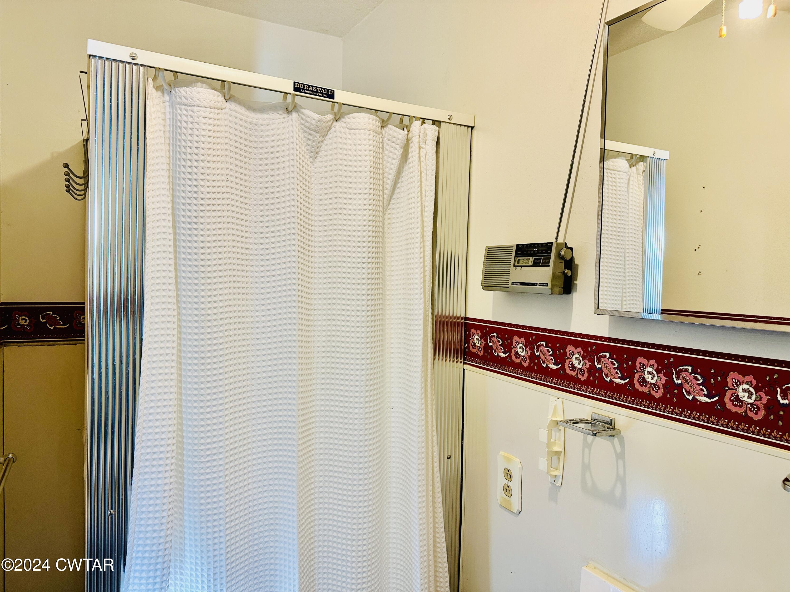 925 McKnight Street Rutherford, TN 38369 - Photo 22 of 23 a bathroom with a shower and a sink