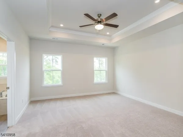 a bathroom with a double vanity sink mirror double and shower