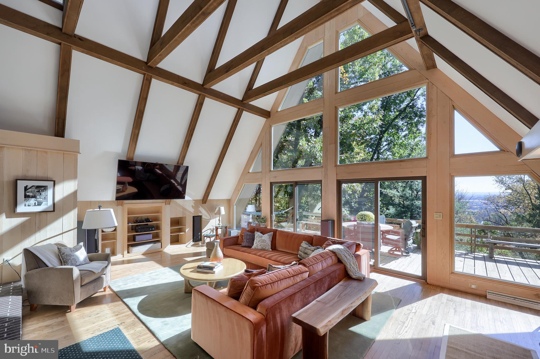2487 Chestnut Ridge Drive Lancaster, PA 17601 - Photo 39 of 96 a living room with fireplace furniture and a large window