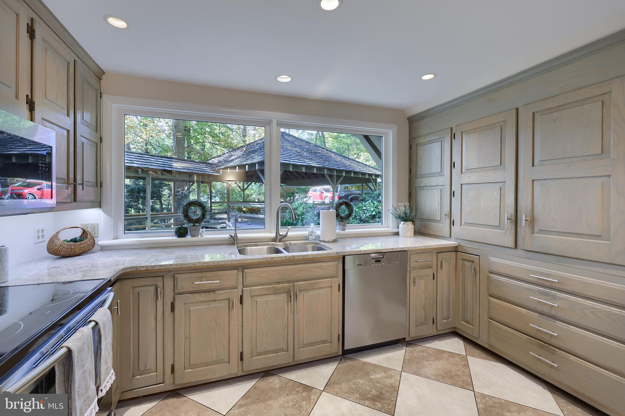 2487 Chestnut Ridge Drive Lancaster, PA 17601 - Photo 43 of 96 a kitchen with a sink and large window