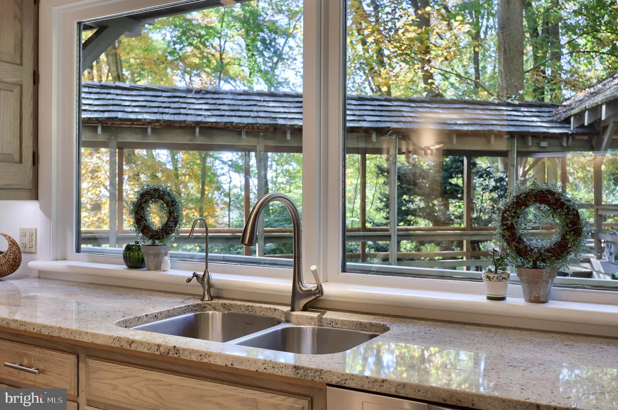 2487 Chestnut Ridge Drive Lancaster, PA 17601 - Photo 45 of 96 a kitchen with a sink and a large window