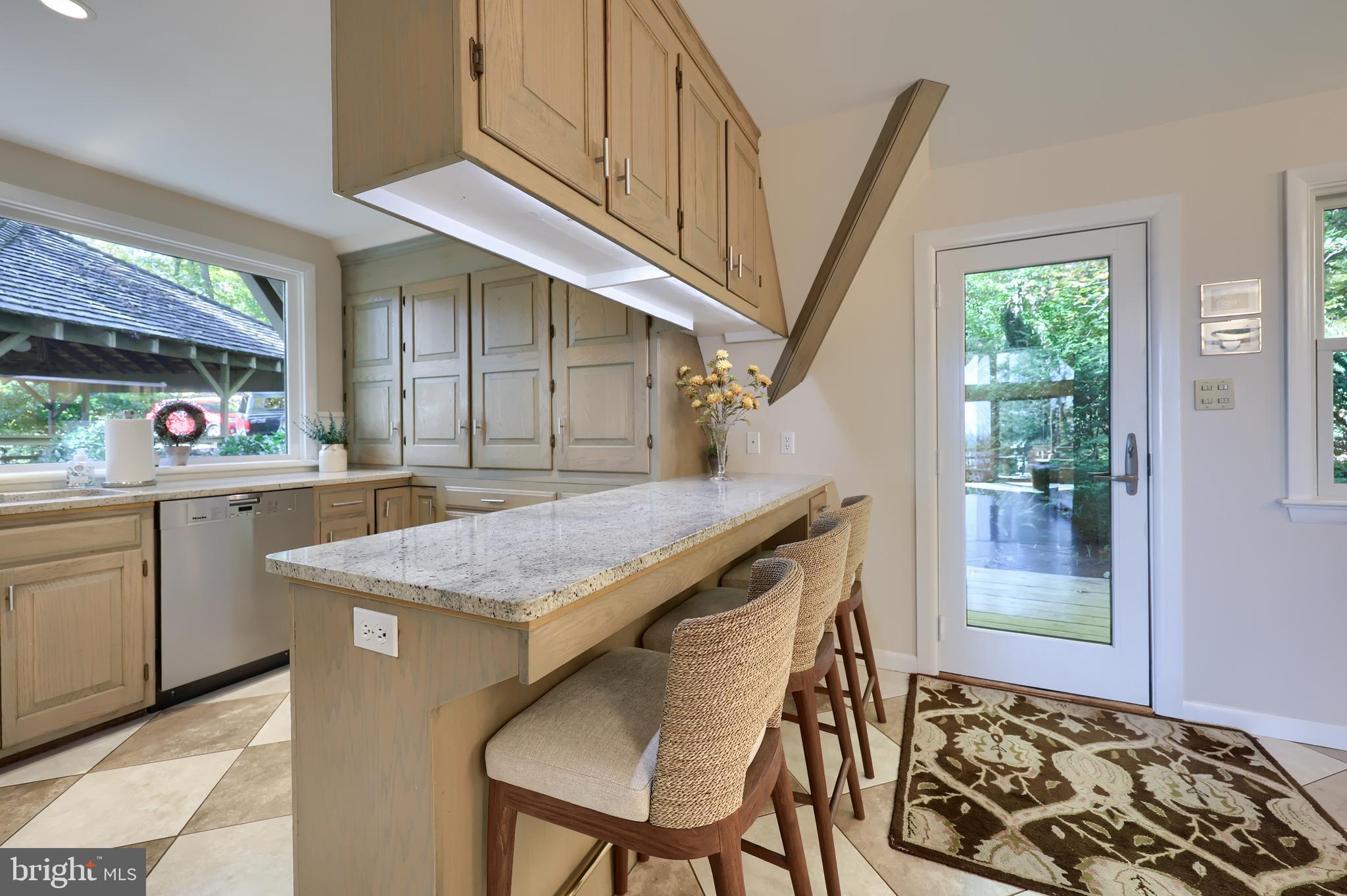 2487 Chestnut Ridge Drive Lancaster, PA 17601 - Photo 47 of 96 a kitchen with a stove a sink and a refrigerator