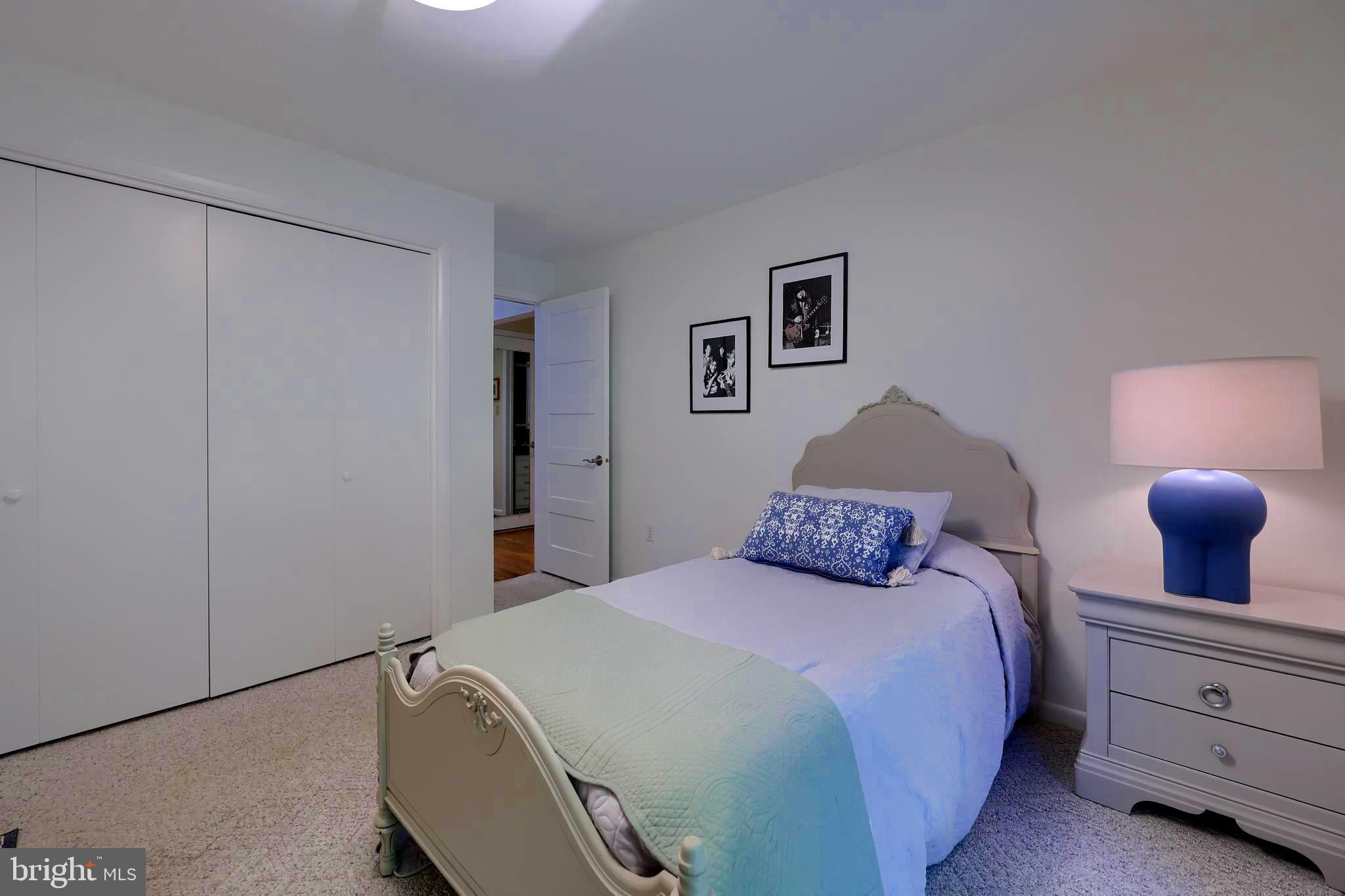 2487 Chestnut Ridge Drive Lancaster, PA 17601 - Photo 57 of 96 a bedroom with a bed and lamp