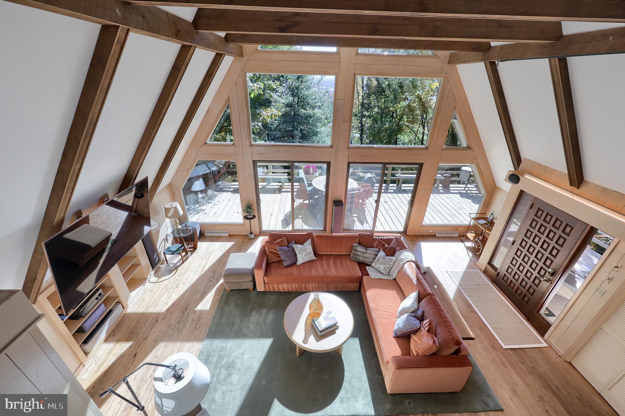 2487 Chestnut Ridge Drive Lancaster, PA 17601 - Photo 61 of 96 a living room with furniture and a floor to ceiling window