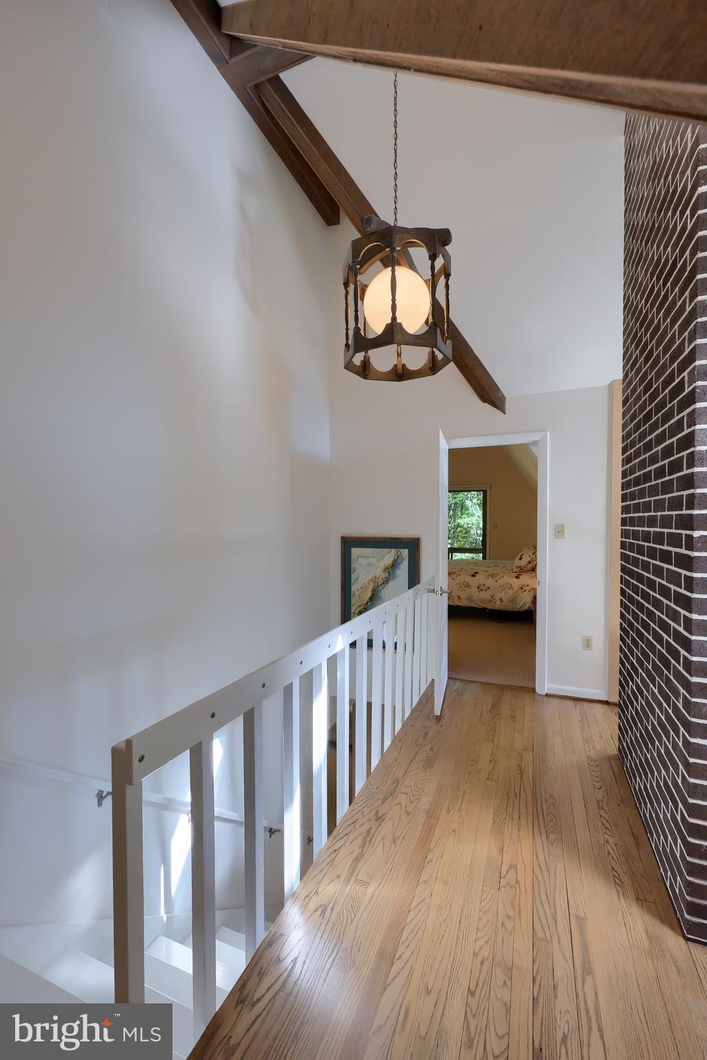 2487 Chestnut Ridge Drive Lancaster, PA 17601 - Photo 63 of 96 a view of a hallway with wooden floor and staircase