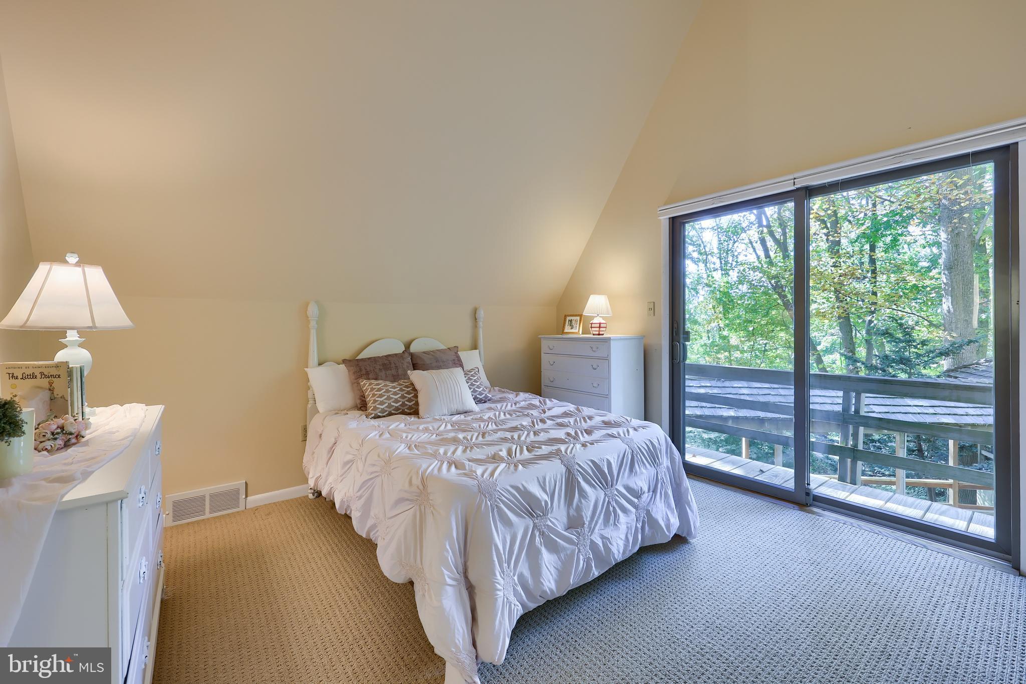 2487 Chestnut Ridge Drive Lancaster, PA 17601 - Photo 64 of 96 a bedroom with a bed and a lamp