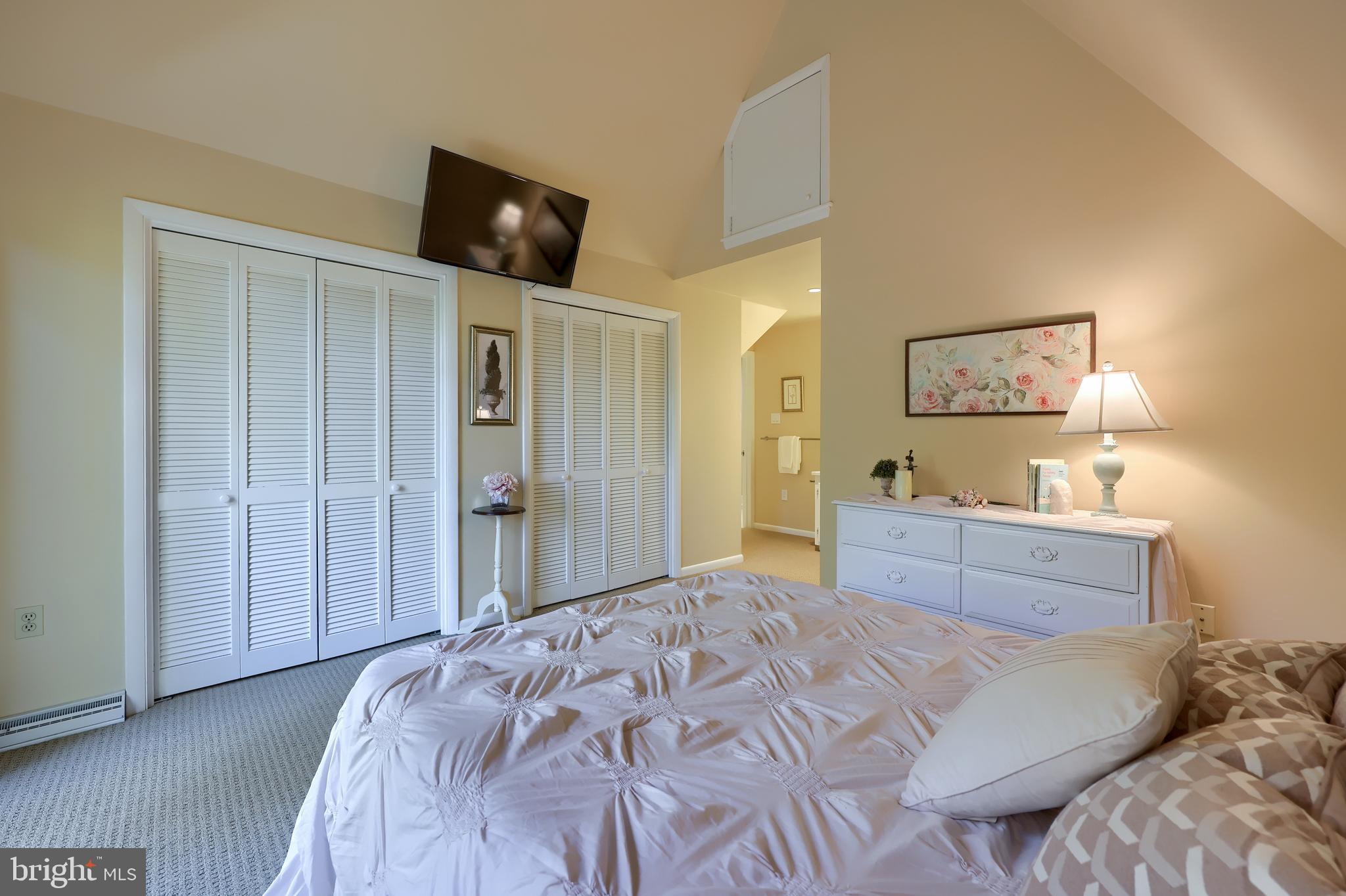 2487 Chestnut Ridge Drive Lancaster, PA 17601 - Photo 65 of 96 a bed room with a bed and mirror