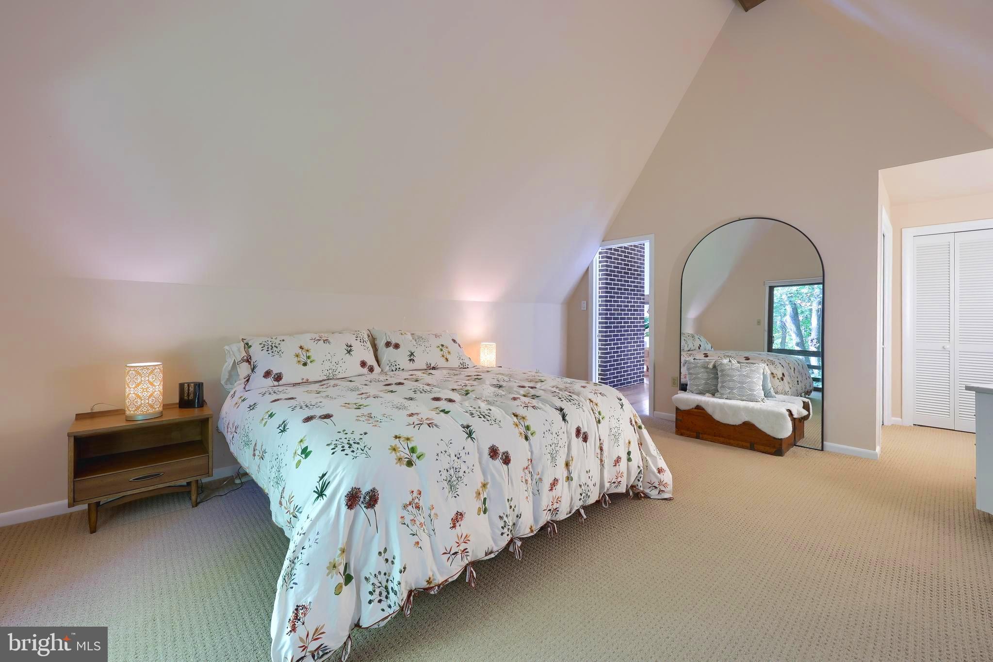 2487 Chestnut Ridge Drive Lancaster, PA 17601 - Photo 69 of 96 a bedroom with a bed and a lamp on dresser