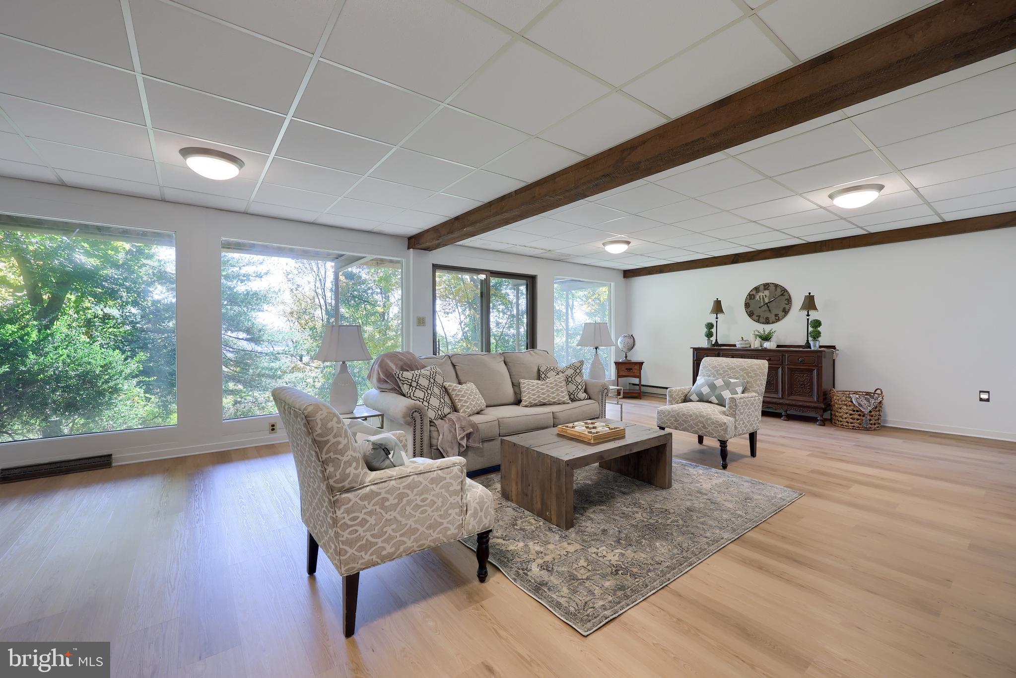 2487 Chestnut Ridge Drive Lancaster, PA 17601 - Photo 87 of 96 a living room with furniture and large windows