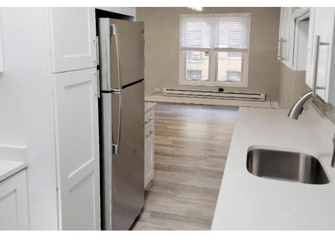 730 West Roscoe Street, Unit 2S Chicago, IL 60657 - Photo 5 of 10 a close view of a sink and a refrigerator