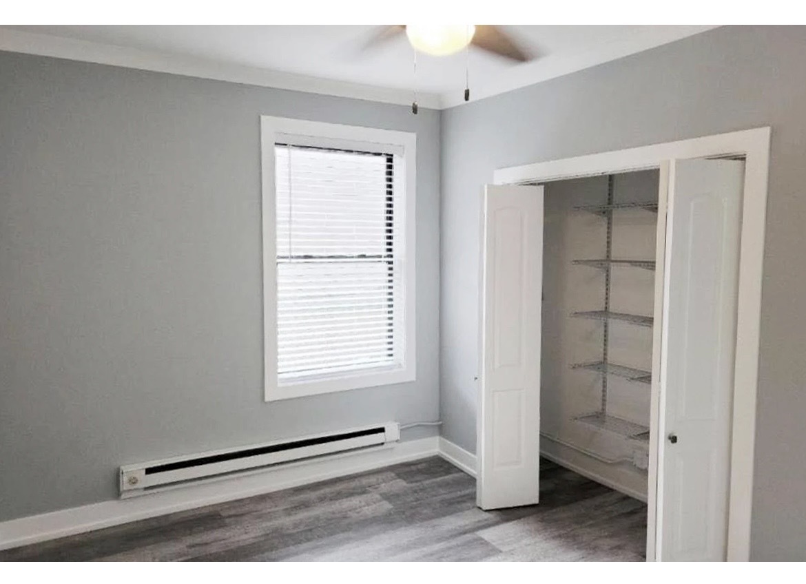 730 West Roscoe Street, Unit 2S Chicago, IL 60657 - Photo 9 of 10 an empty room with windows