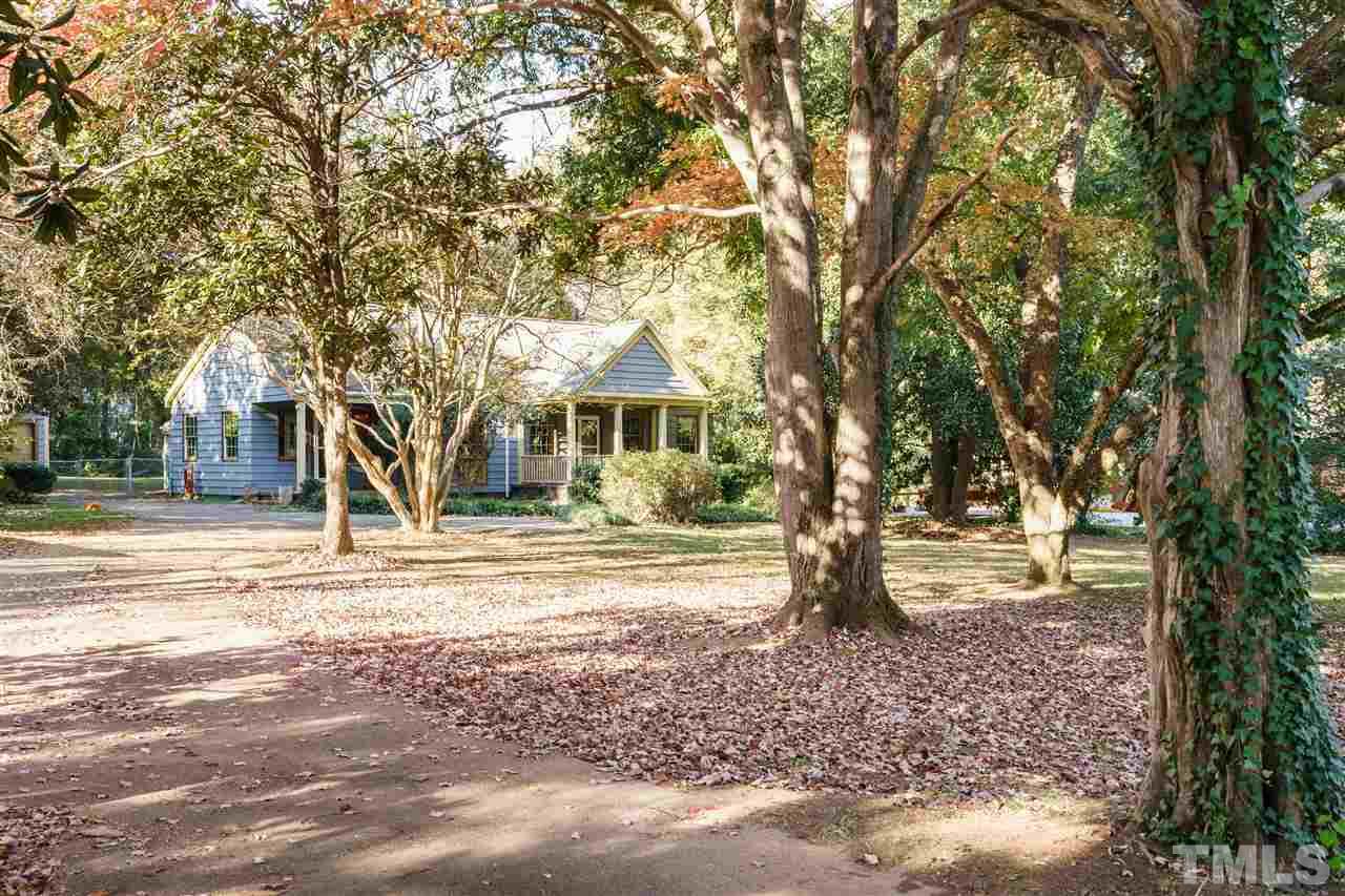 205 Lord Berkley Road Raleigh, NC 27610 - Photo 2 of 25 a front view of a house with a yard