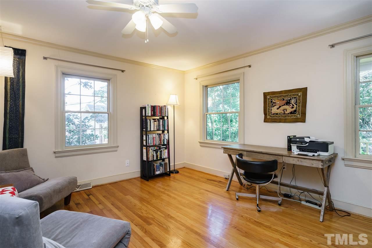 205 Lord Berkley Road Raleigh, NC 27610 - Photo 14 of 25 a workspace with lounge chair and a window