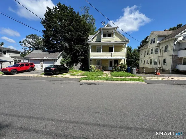 a car parked in front of a building