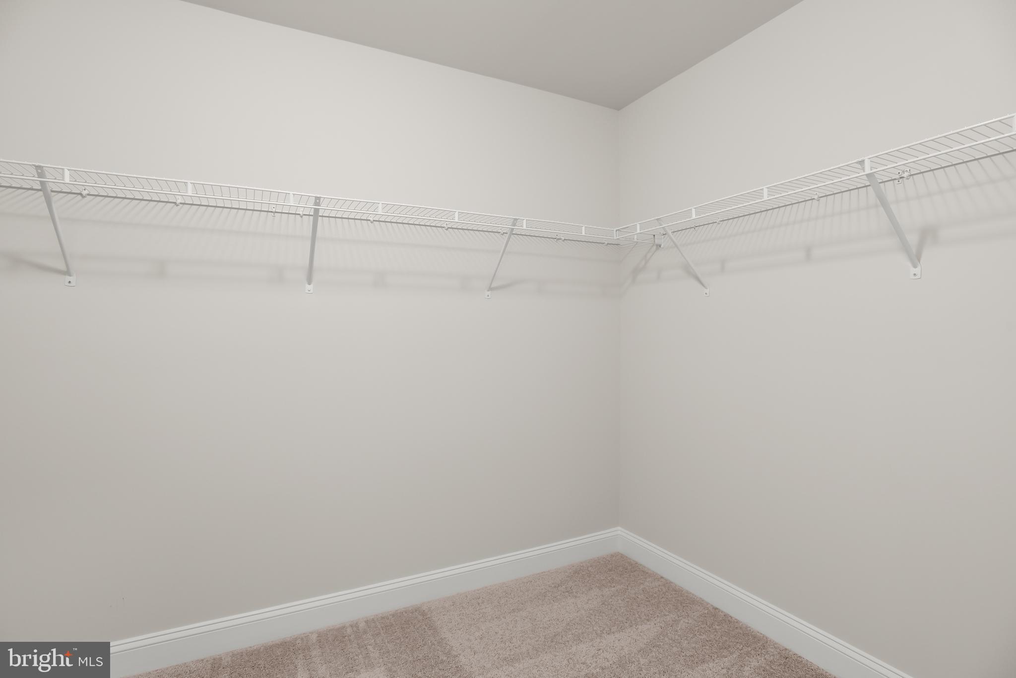 6813 Martin Road Columbia, MD 21044 - Photo 22 of 51 Primary Bedroom Walk-in Closet