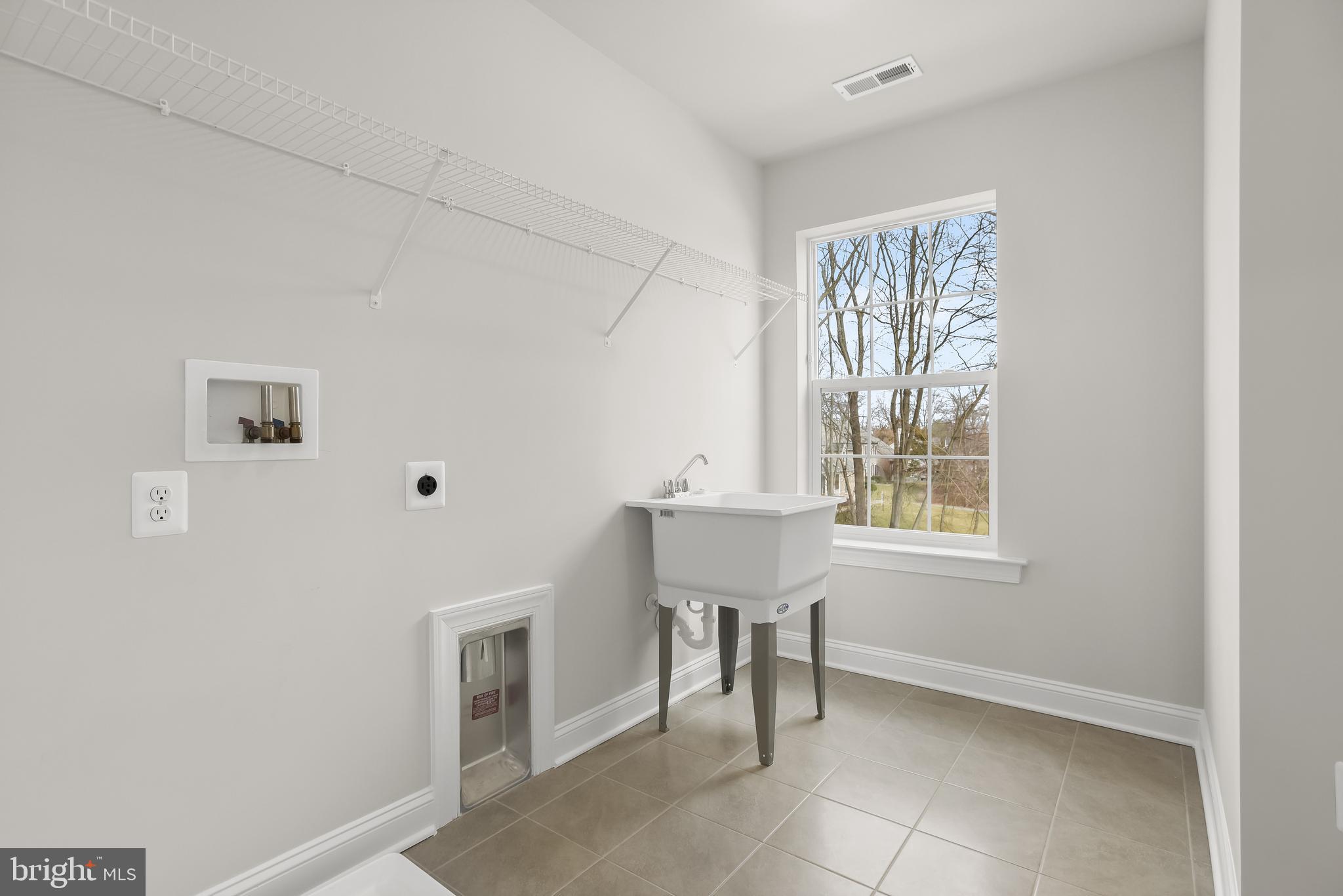 6813 Martin Road Columbia, MD 21044 - Photo 33 of 51 Laundry Room