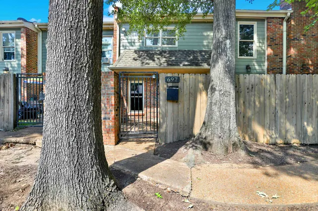a front view of a house with a porch