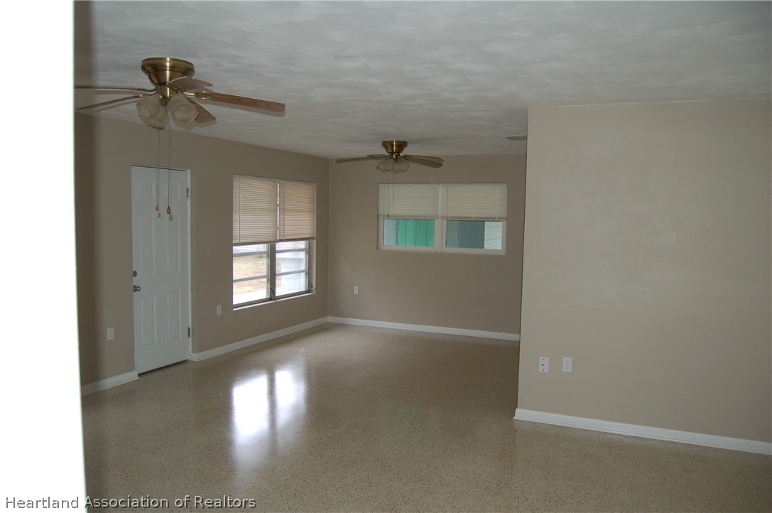 3029 West Verona Road Avon Park, FL 33825 - Photo 24 of 25 an empty room with a empty space and windows