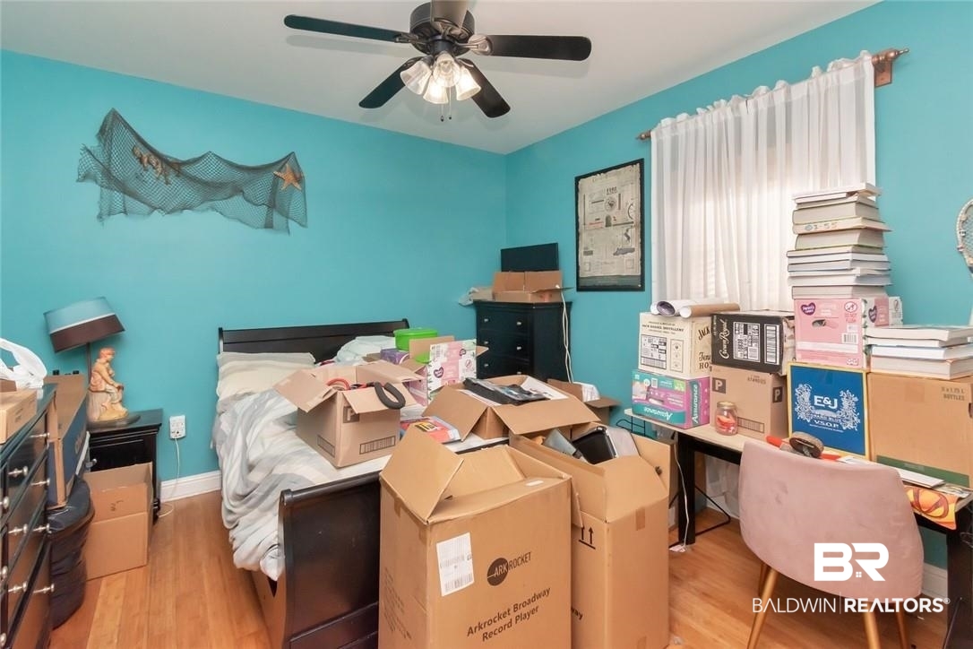 7170 Pierson Drive Mobile, AL 36619 - Photo 19 of 29 Bedroom with ceiling fan and light hardwood / wood-style flooring