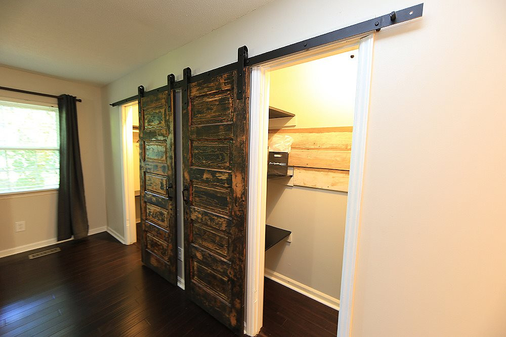 6579 New Market Way, Unit 6579 Raleigh, NC 27615 - Photo 9 of 22 Barn Door Dual Wall Closets with a Walk In Closet 10 steps away...Tons of Storage ! Dual Wall Closets