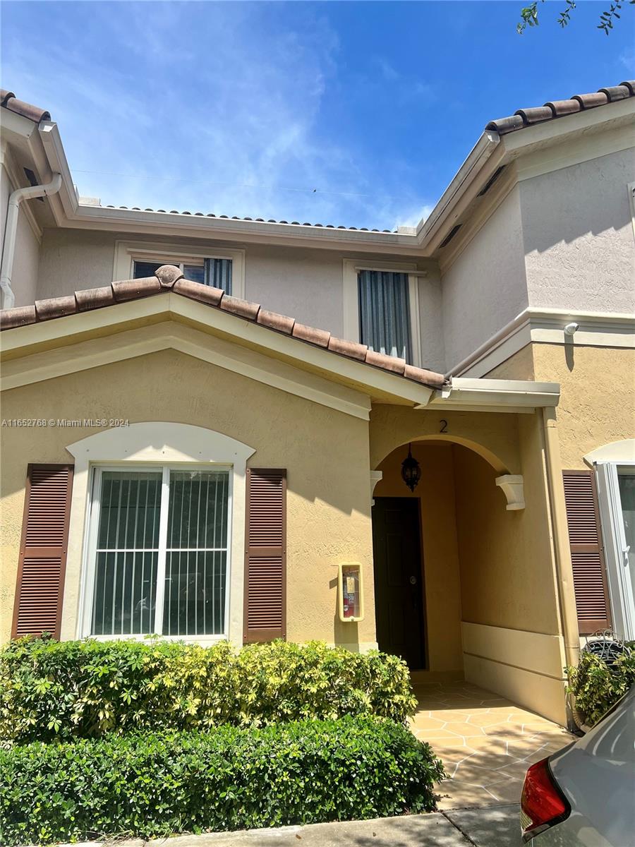 8924 West Flagler Street, Unit 2 Miami, FL 33174 - Photo 1 of 7 a view of a house with a yard