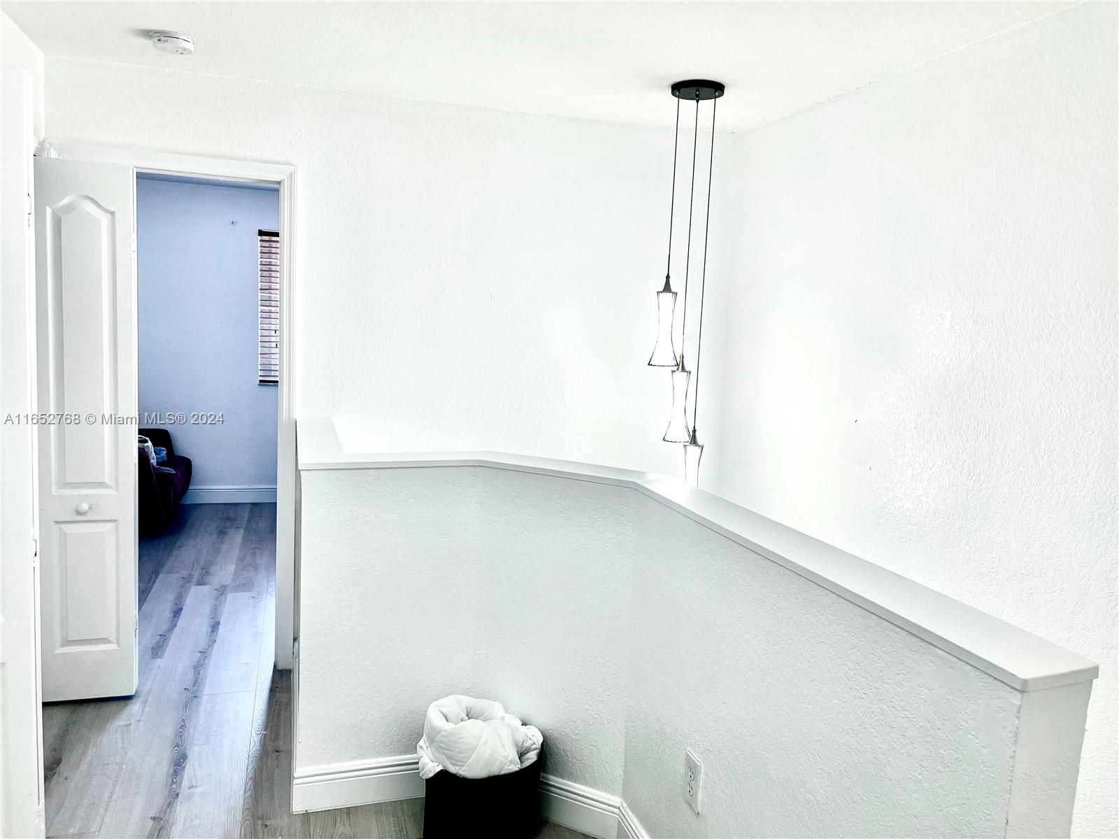 8924 West Flagler Street, Unit 2 Miami, FL 33174 - Photo 6 of 7 a view of a room with wooden floor