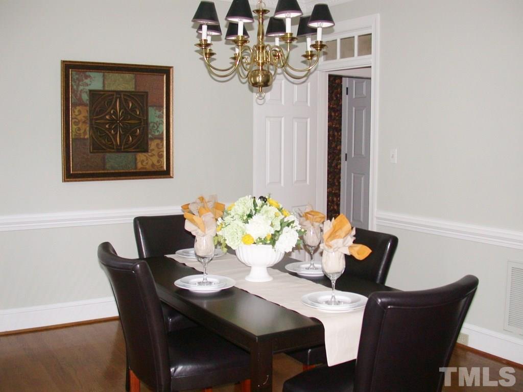 11604 Chipaway Court Raleigh, NC 27614 - Photo 12 of 25 a dining room with furniture and window