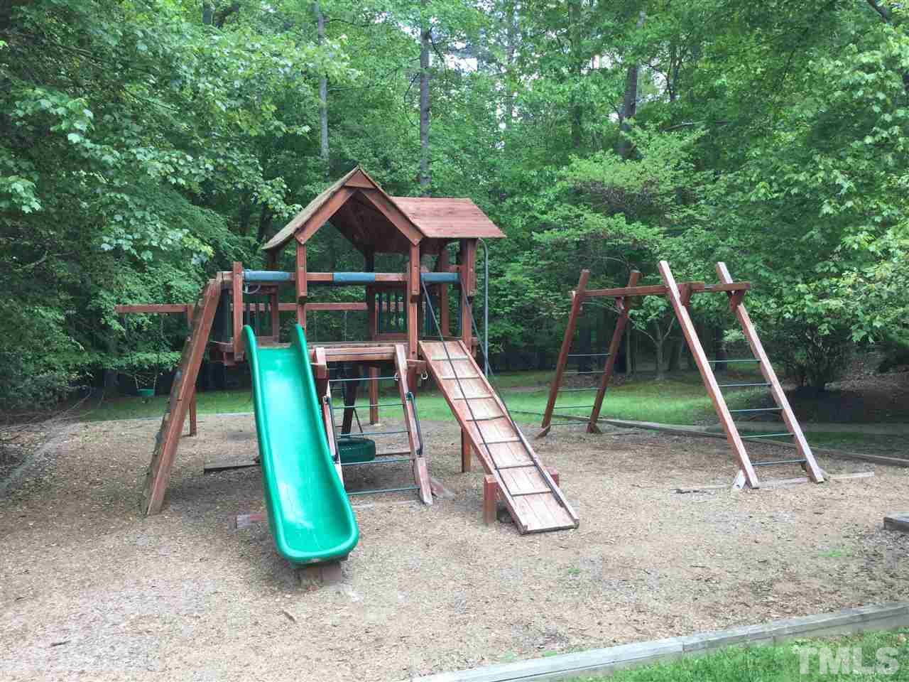 11604 Chipaway Court Raleigh, NC 27614 - Photo 21 of 25 a view of a park with a slide