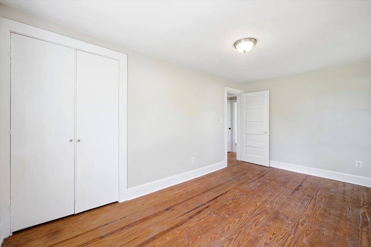 5096 Battlefield Road Harrisonburg, VA 22801 - Photo 20 of 38 a view of an empty room with wooden floor