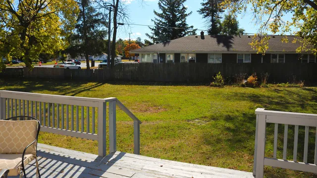 a view of swimming pool with outdoor seating