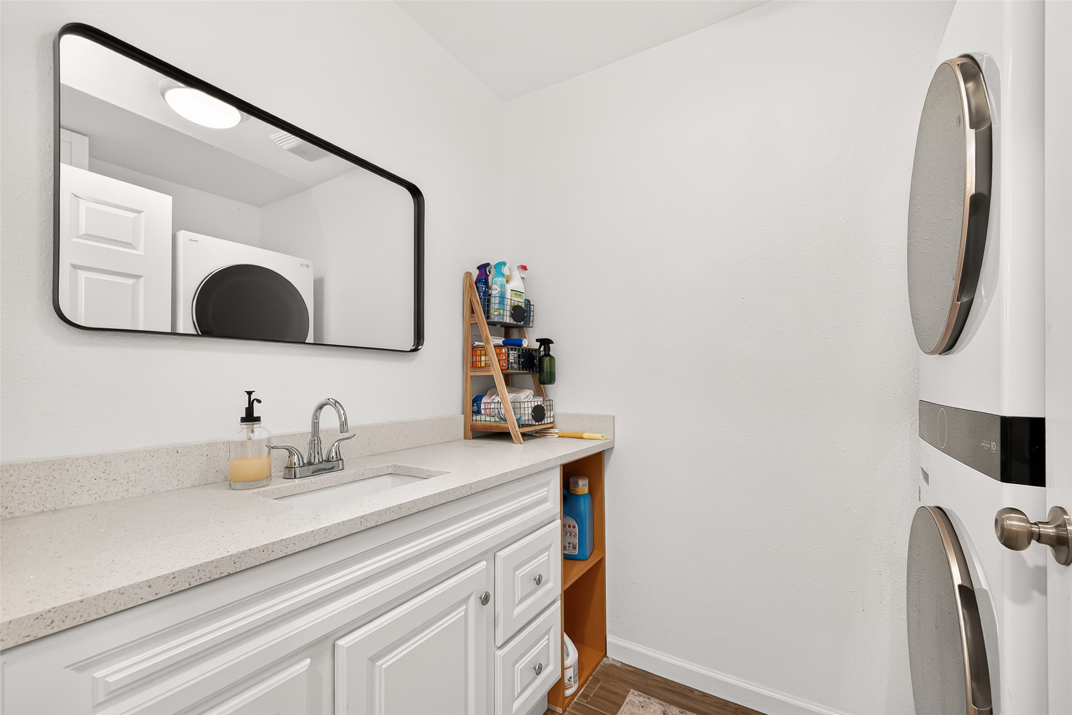 548 Brandon Road Conroe, TX 77302 - Photo 30 of 37 Spacious utility room with sink to make laundry days efficient.
