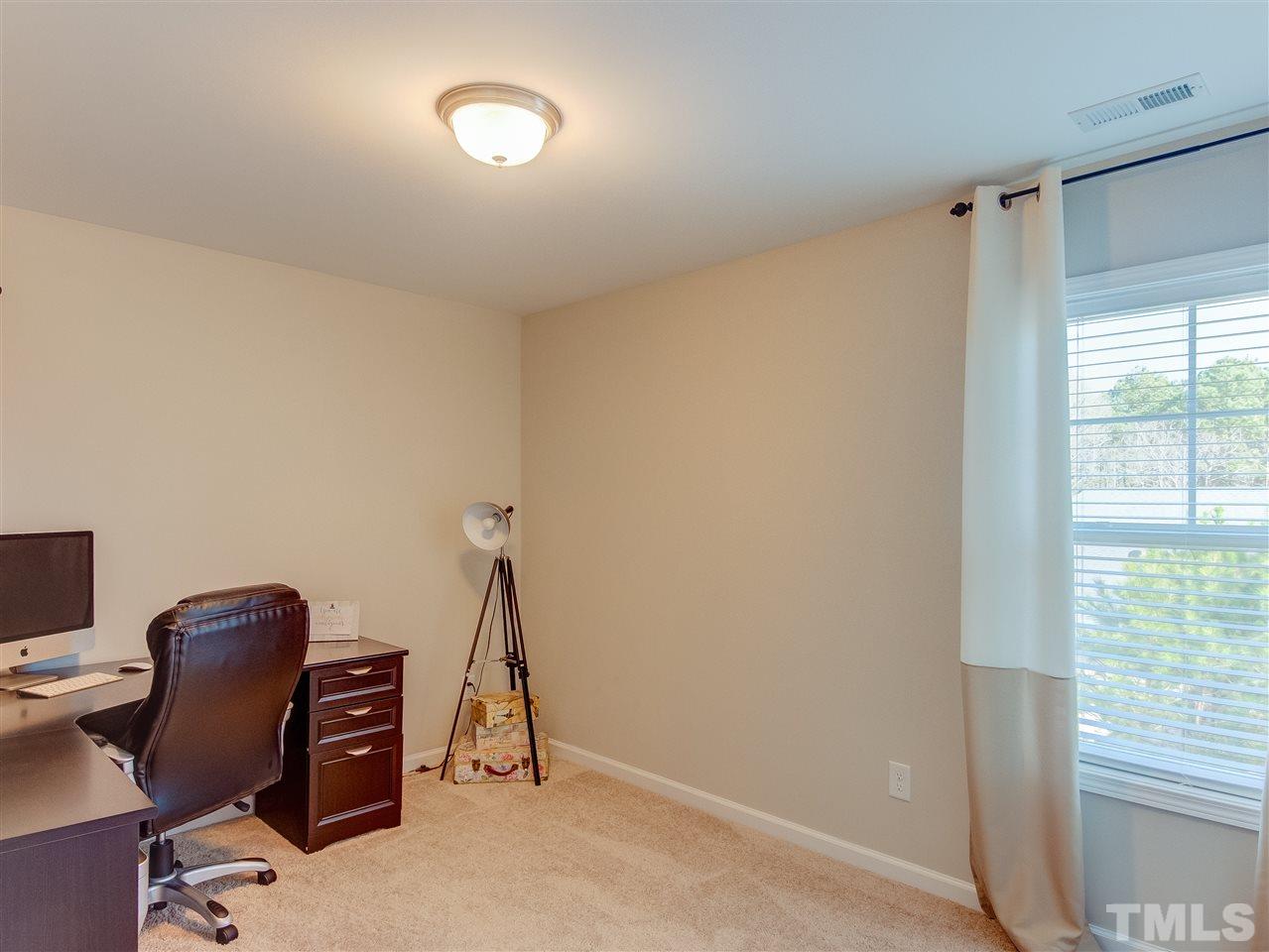 30 Mariners Point Way Garner, NC 27529 - Photo 20 of 25 2nd of 3 Secondary Bedrooms located on 2nd floor at rear of home; has walk in closet. Currently used as an office.