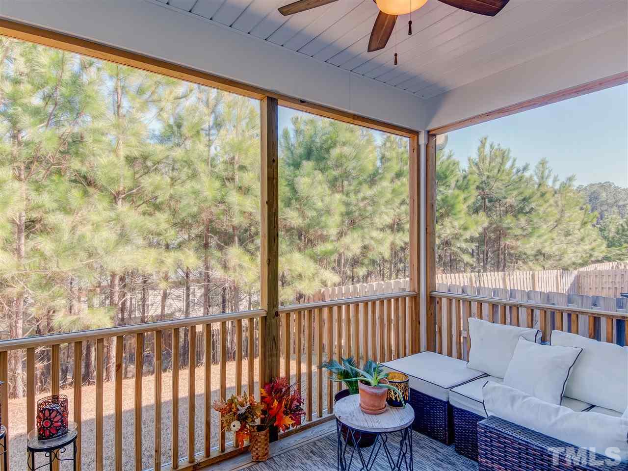 30 Mariners Point Way Garner, NC 27529 - Photo 22 of 25 Enjoy entertaining on the screened porch located off the kitchen and overlooking the fenced back yard.