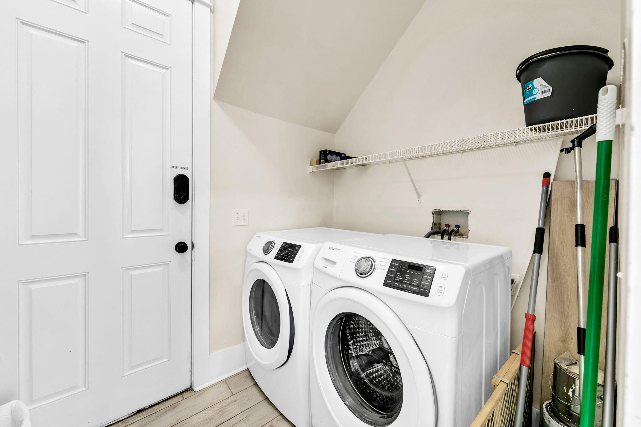 67 Sarasota Street Miramar Beach, FL 32550 - Photo 12 of 61 a view of storage and utility room with washer and dryer