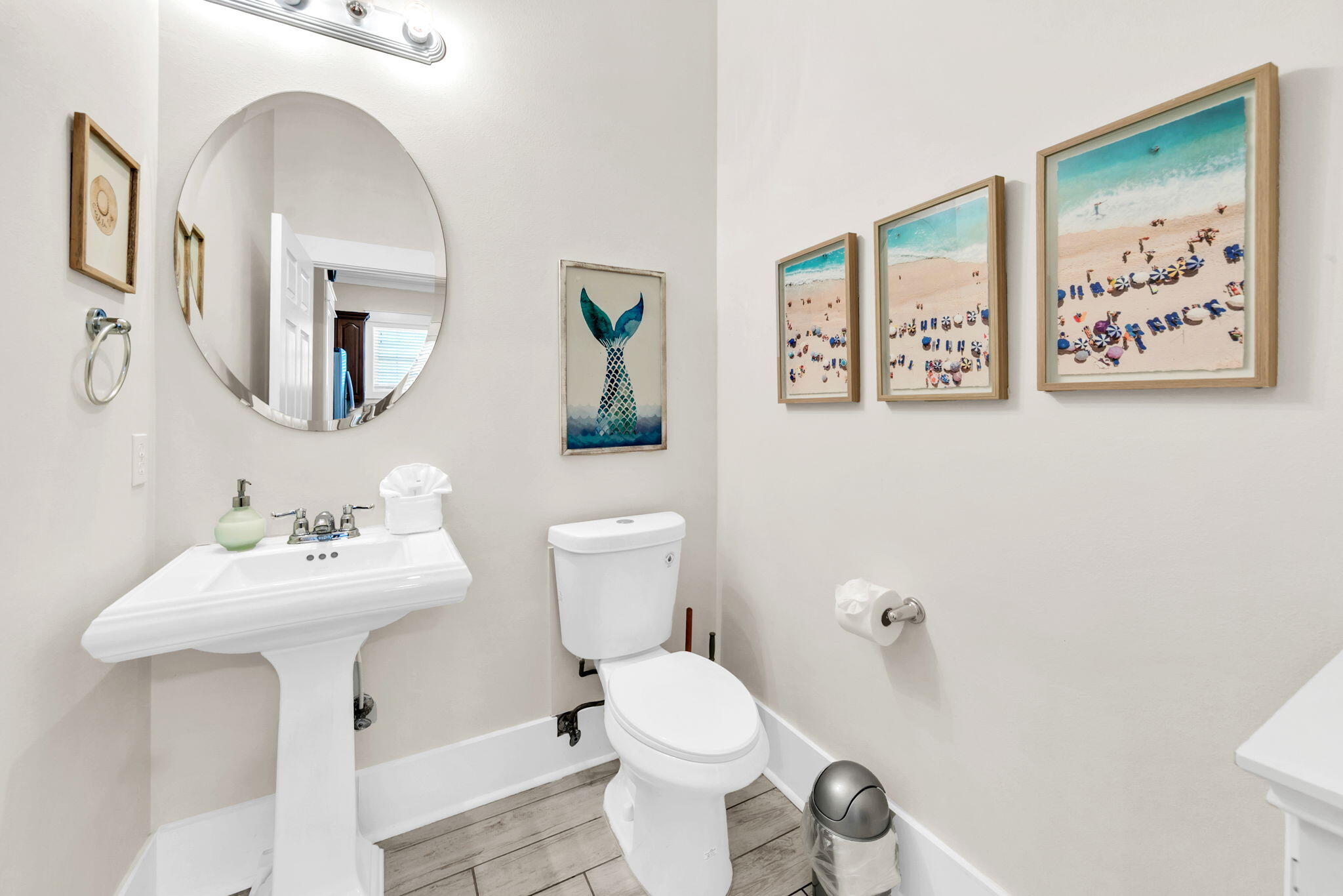 67 Sarasota Street Miramar Beach, FL 32550 - Photo 13 of 61 a bathroom with a toilet sink and mirror