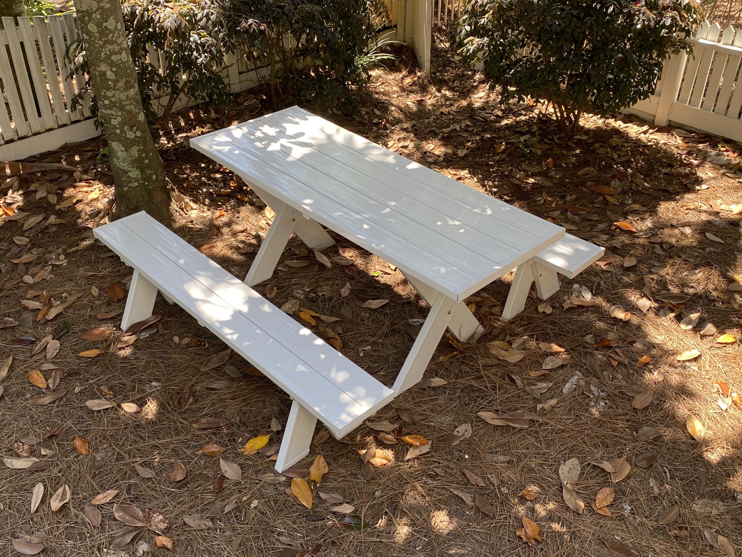 67 Sarasota Street Miramar Beach, FL 32550 - Photo 41 of 61 an aerial view of a wooden chairs and table in the patio