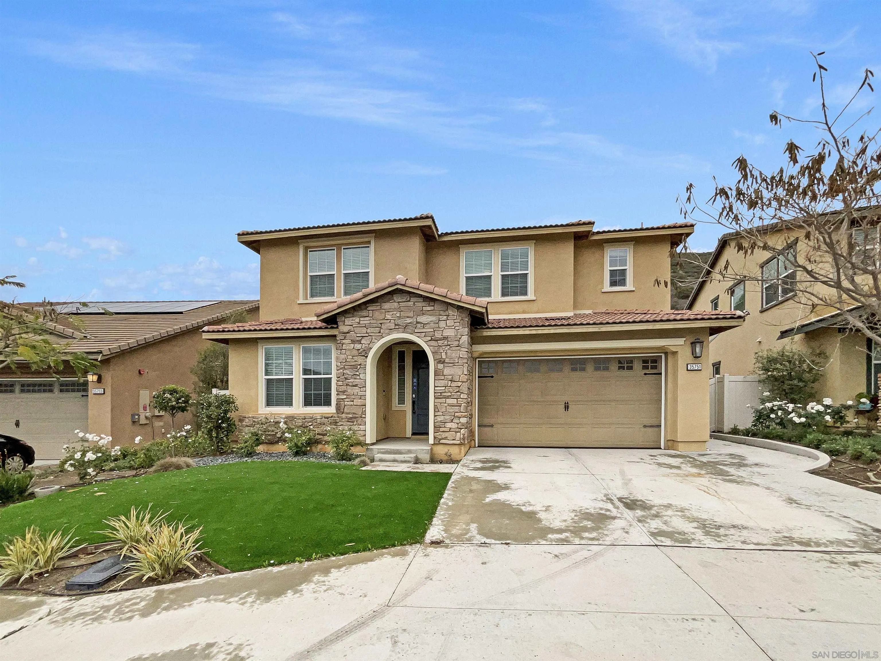 35751 Garrano Lane Fallbrook, CA 92028 - Photo 1 of 28 a front view of a house with a garden