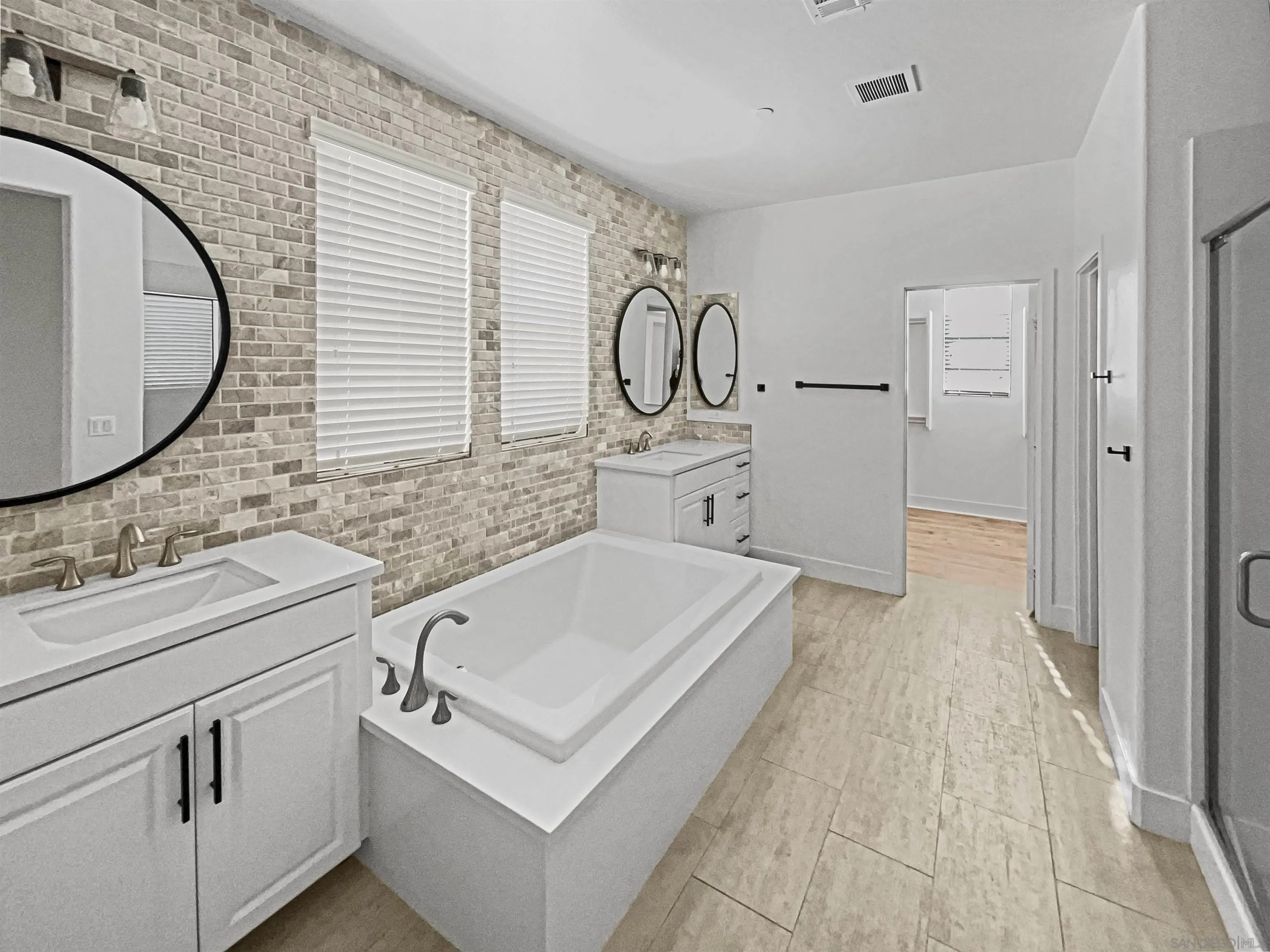 35751 Garrano Lane Fallbrook, CA 92028 - Photo 14 of 28 a bathroom with a sink and a mirror
