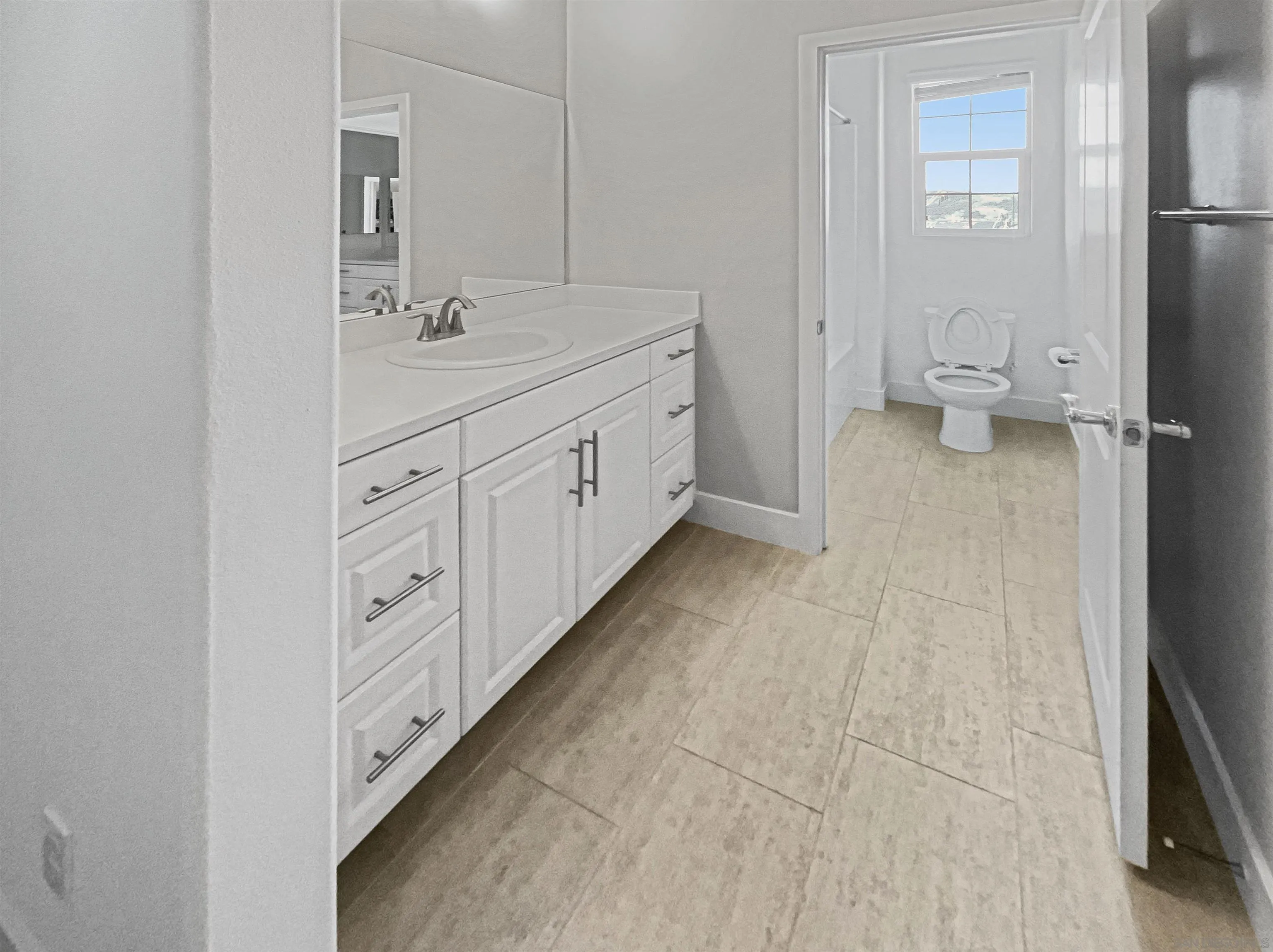 35751 Garrano Lane Fallbrook, CA 92028 - Photo 19 of 28 a bathroom with a double vanity sink and mirror
