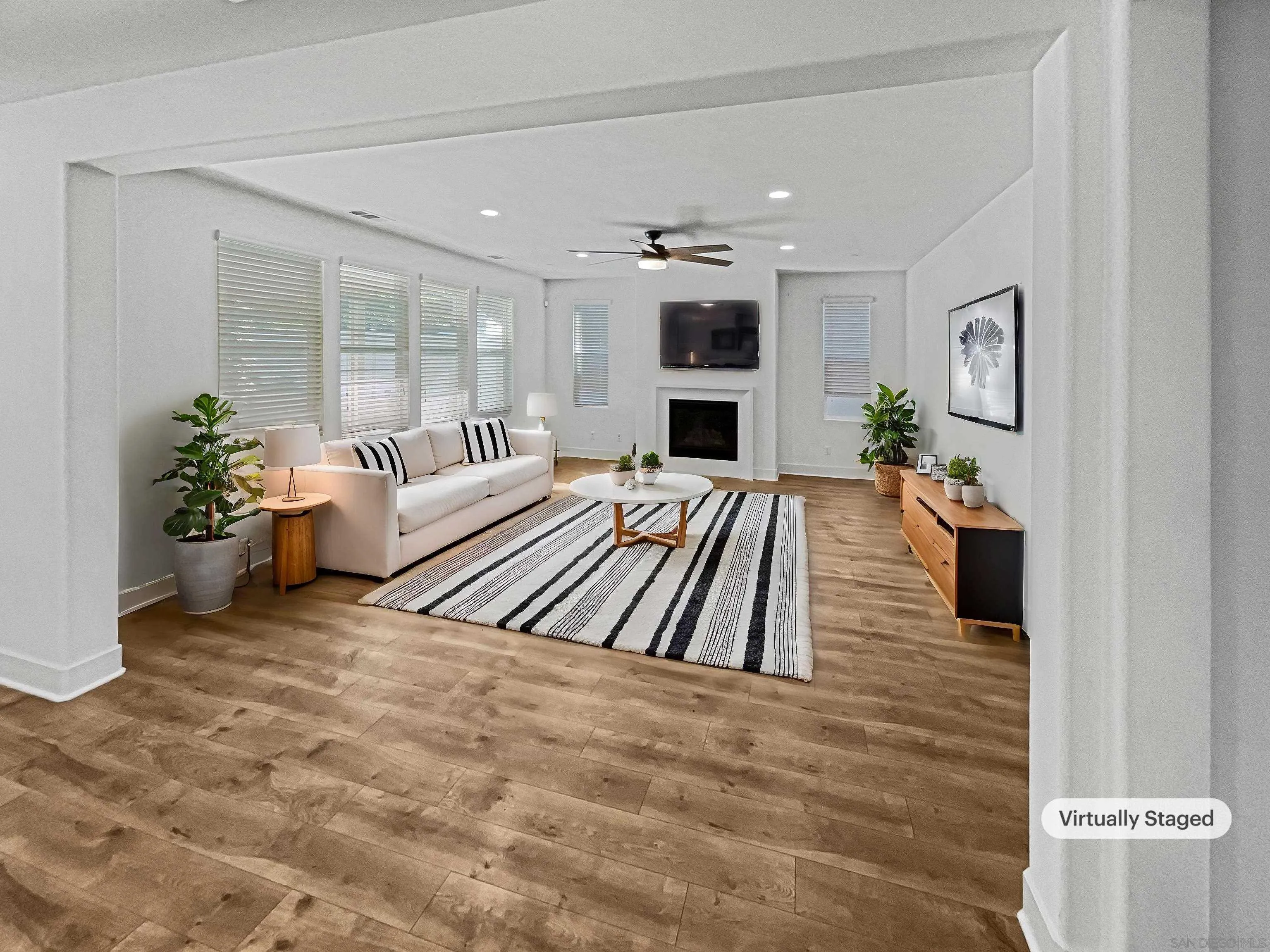 35751 Garrano Lane Fallbrook, CA 92028 - Photo 2 of 28 a living room with furniture and a fireplace