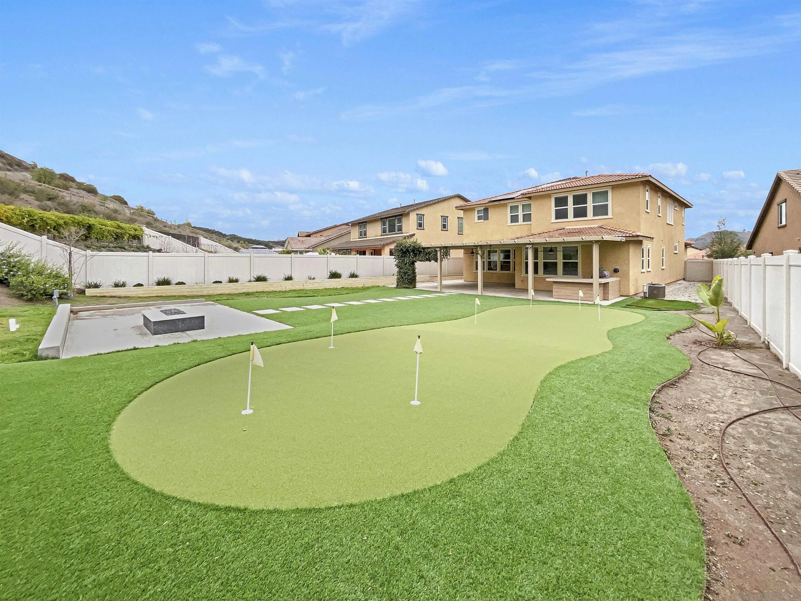 35751 Garrano Lane Fallbrook, CA 92028 - Photo 26 of 28 a view of a house with a big yard