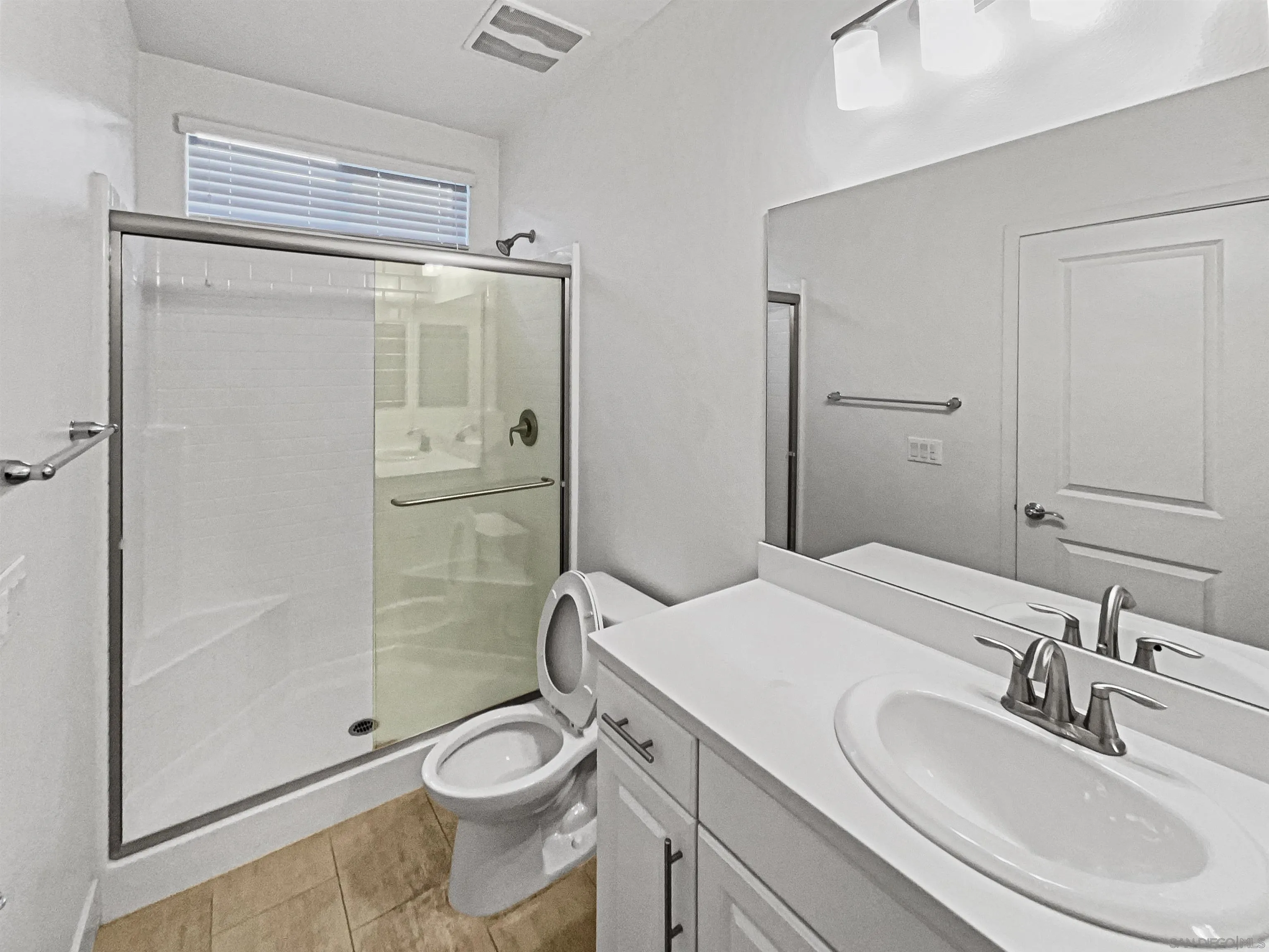 35751 Garrano Lane Fallbrook, CA 92028 - Photo 7 of 28 a bathroom with a sink a toilet and shower